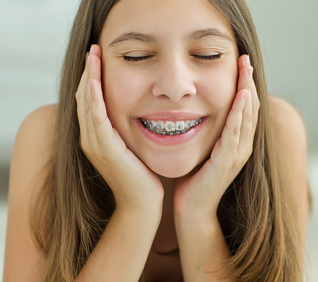 How to Take Care of Teeth During and After Braces - Long Grove